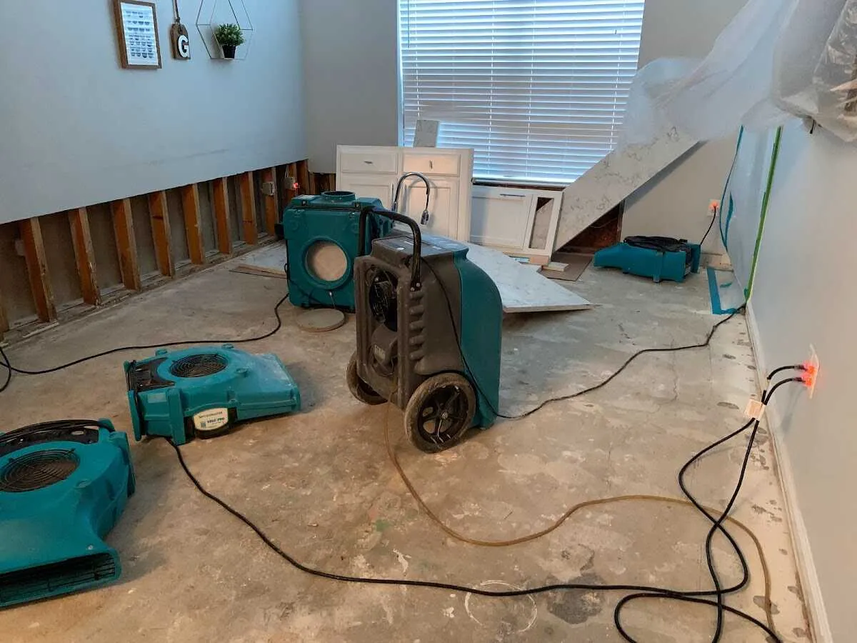 Dehumidifier in flood-cut room for Water Damage Restoration in McGregor